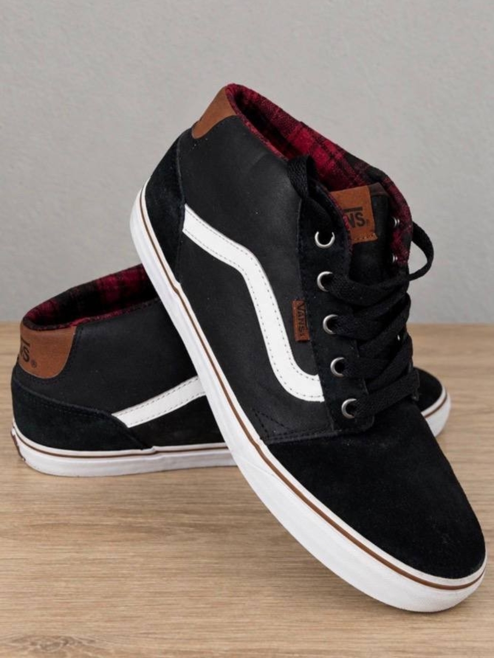 Vans Black Mid-Top Sneakers with White Side Stripe and Brown Accents